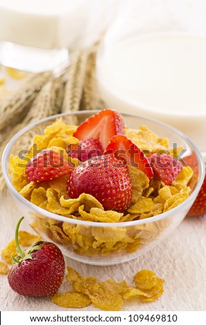 corn flakes with strawberries amd milk
