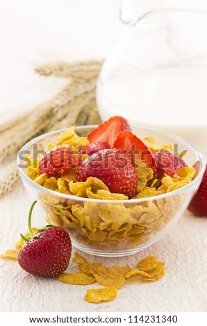 corn flakes with milk and strawberries