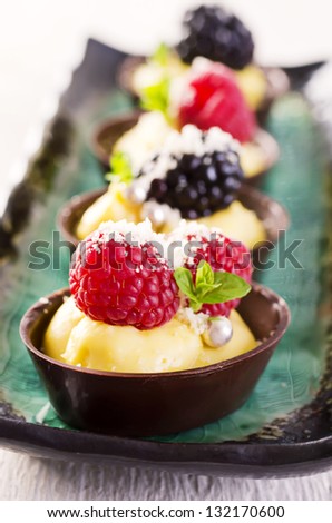 chocolate tartlets with berry topping