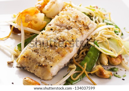 fish with noodles and vegetable