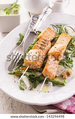 grilled salmon skew with rocket salad