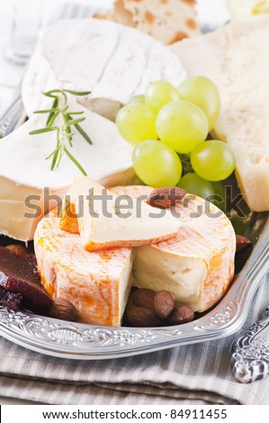 different types of cheese on tray