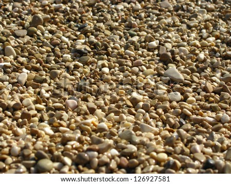 Pebbles with rounded corners on a beach