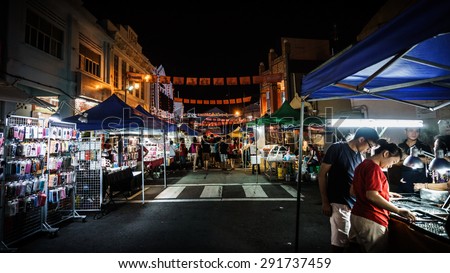 Malacca, Malaysia - April 10, 2015: The stall of many shops around Jonker Walk street , China town in Malacca, Malaysia in the night time of April 2015.