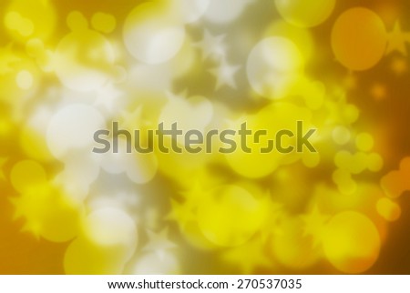 Bokeh circles,star on light yellow background.