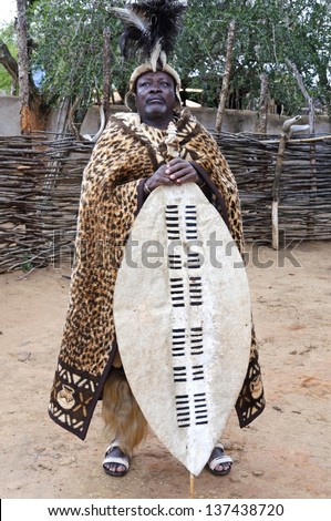 SHAKALAND, REPUBLIC OF SOUTH AFRICA - AUGUST 27: Zulu man in traditional clothes on August 27, 2009 in Shakaland, South Africa. The Zulu are the largest South African ethnic group