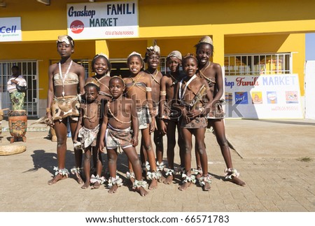 AFRICA - AUG 22: Unidentified children posing for the camera after dance show for tourists, near to Kruger National Park Reserve, August 22, 2009 South Africa