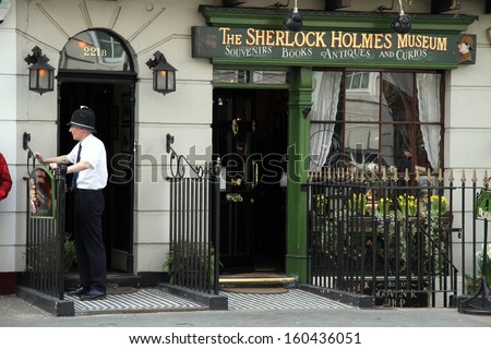 London, UK - april 9, 2010- Policeman actor outside the Sherlock Holmes Museum at 221B Baker Street, the home of the famous fictitious Victorian private detective