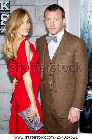 Jacqui Ainsley and director Guy Ritchie at the Los Angeles Premiere of \