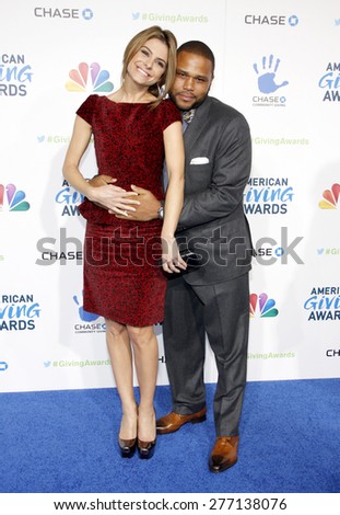 Anthony Anderson and Maria Menounos at the 2012 American Giving Awards held at the Pasadena Civic Auditorium in Pasadena on Decmber 7, 2012.