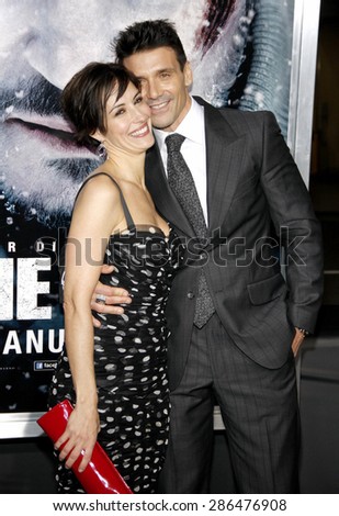 Wendy Moniz and Frank Grillo at the Los Angeles premiere of \'The Grey\' held at the Regal Cinemas L.A. Live in Los Angeles on January 11, 2012.