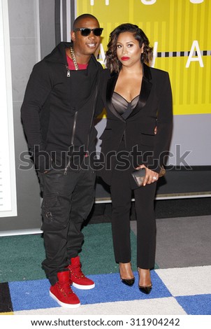 LOS ANGELES, CA - AUGUST 30, 2015: Ja Rule and Aisha Atkins at the 2015 MTV Video Music Awards held at the Microsoft Theater in Los Angeles, USA on August 30, 2015.
