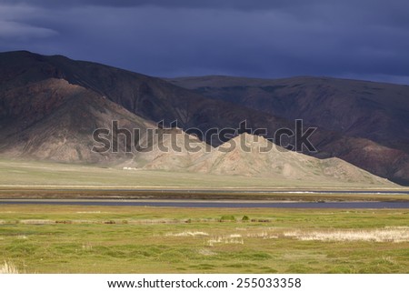 Early morning in a green savanna mountains in Tolbo lake, Mongolia
