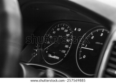 speedometer and dashboard car black and white photography