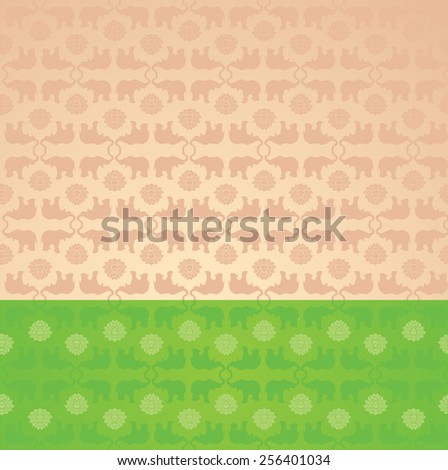 Vintage green and cream classical oriental elephant and lotus pattern background with space for text