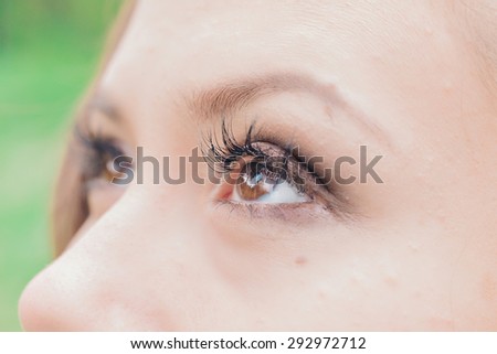 girl eye close-up with long eyelashes