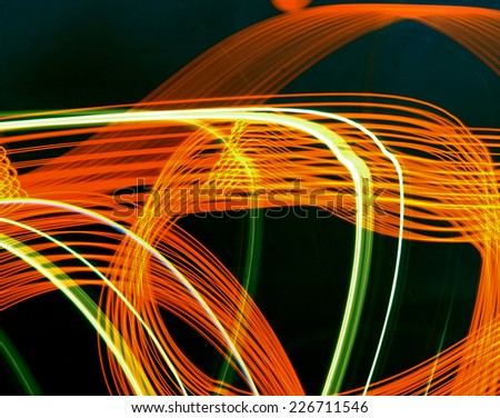 This series of images was shot on Long Island roads at night, by moving my camera rhythmically, against the glow of oncoming neon lights and head lights.