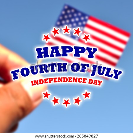 happy fourth of july - independence day card on de focused american flag in blue sky background