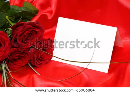 red roses and invitation card