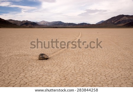 Racetrack Playa is a seasonally dry lake (playa) located in the northern part of the Panamint Mountains that is famous for rocks that mysteriously move across its surface.