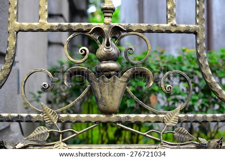 Forged decorative iron fence details.