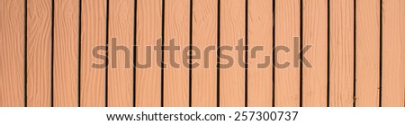 A brown wood Stacked. we can use it to backgrounds in a pictures.