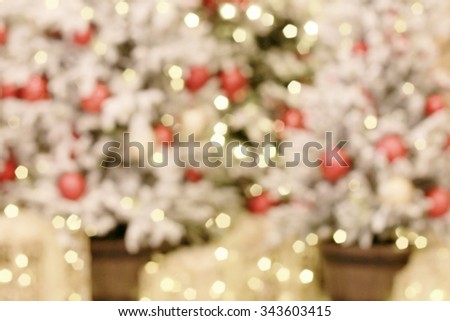 Christmas is a time of love To celebrate the birth of the child, little Jesus. Pictures of hope that God cares for human sin. The Christmas tree is decorated in a shopping mall blurred background.