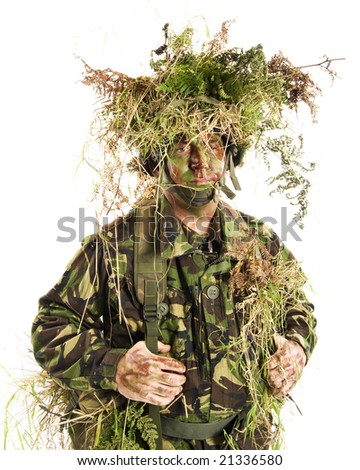 stock-photo-man-dressed-in-british-army-camouflage-enhanced-with-grasses-and-ferns-21336580.jpg