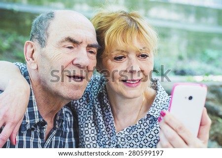 Old father and the daughter are photographed