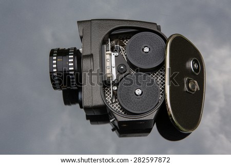 Old movie camera with open lavished channel