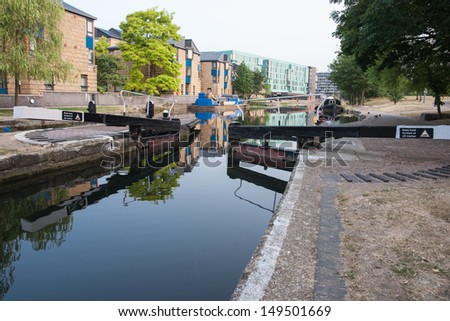 Old Ford Lock on London\'s Regent\'s Canal, early morning calm and reflections.
