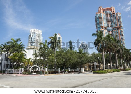 MIAMI, USA - JUNE 28; Hotel and apartment high rise buildings set amongst the palm trees on June 28, 2012  The modern sky scraper accommodation buildings dominate the skyline.