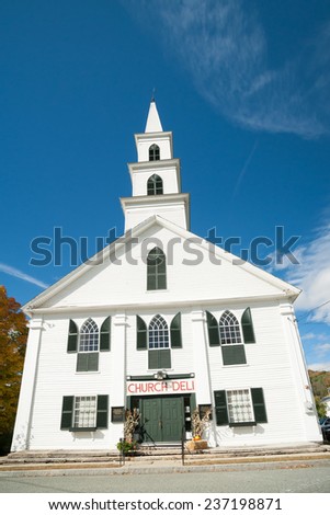 NEWFANE, USA - OCTOBER 11; small white church on market day, example of greek revival architecture on October 11, 2014 in Newfane Historic District, USA