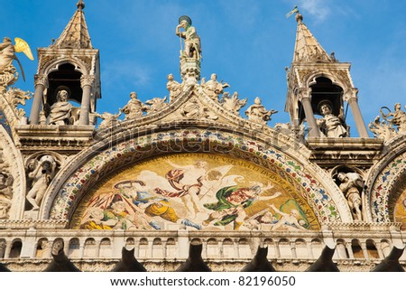 Mosaic art adorning the facade of Saint Mark\'s Basilica, Venice, Italy.