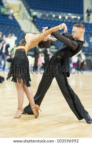 MINSK - MAY 19: Unidentified Dance Couple performs Youth  Latin Program on World Open Minsk 2012 WDSF  Championship on MAY 19, 2011, in Minsk, Re[ublic of Belarus