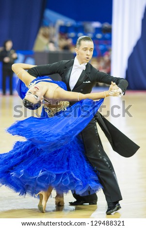 MINSK-BELARUS, FEBRUARY, 17: Unidentified Dance couple performs Adult standard program on The Championship of the Republic of Belarus 2013 in February 17, 2013 in Minsk, Republic Of Belarus