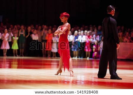 MINSK-BELARUS, MAY, 19: ZORAN PLOHL-? TATSIANA LAHVINOVICH (SLOVENIA) perform WDSF World Dance Show on Latin-American Program on the World Open Minsk 2013 Championship in May 19,2013,in Minsk, Belarus