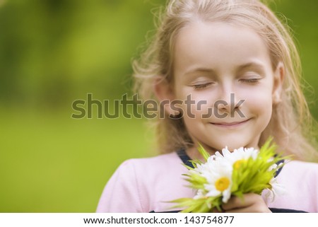 portrait of little cute caucasian girl smiling. horizontal shot