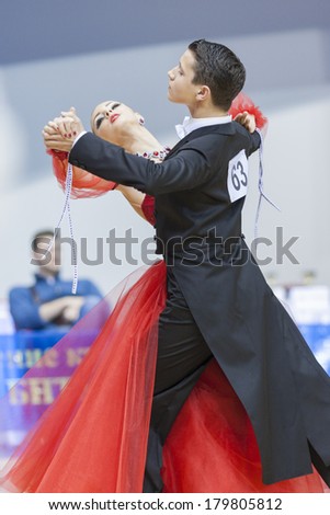 MINSK-BELARUS,FEBRUARY,9:Unidentified Dance Couple performs Youth-2 Standard Program on Ogni Stolicy (Lights of the Capital) 2014 WDSF  Championship on February, 9, 2014, in Minsk, Republic of Belarus
