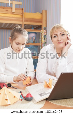 Caucasian Family Together Making Crafts. Vertical Image
