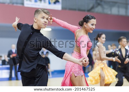 MINSK, BELARUS - FEB 23: Unidentified Dance Couple Performs Youth-2 Latin-American Program on Open Minsk WDSF Championship 2014 on February, 23, 2014, in Minsk, Republic of Belarus