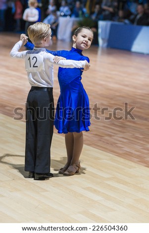 Minsk-Belarus, October 19, 2014: Unidentified Dance Couple Performs Juvenile European Standard Program on IDSA World Open Championship 2014 in October 19, 2014, in Minsk, Republic of Belarus