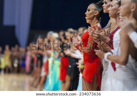 Minsk-Belarus, October 4, 2014: Dance couples standing prior to the WDSF World Open Minsk Championship 2014 start-off in October 4, 2014, in Minsk, Republic of Belarus