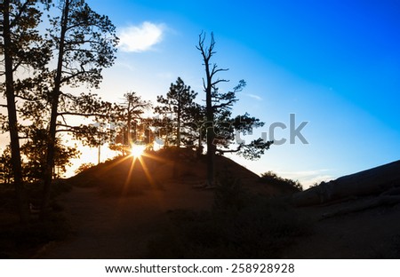 Ascending Sun in the Very Early Morning at Sunrise Point of Bryce Canyon National Park in Utah, United States Of America. Horizontal Image
