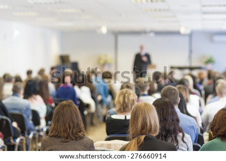 People on the Conference Listening to the Lecturer. Back View. Horizontal Image Composition