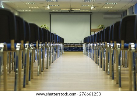 Row of Modern Chairs Standing in Line in The Empty Auditorium. Horizontal Image Composition
