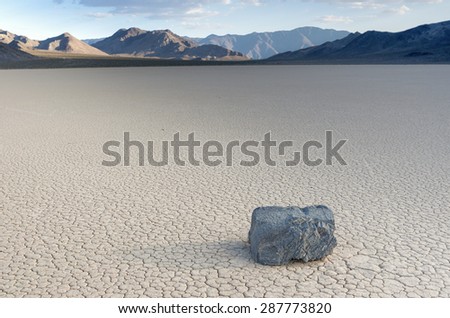 Mysteriously Moving Stones and its Long Traces at The Racetrack Playa in Death Valley National Park, California. Horizontal Image Composition