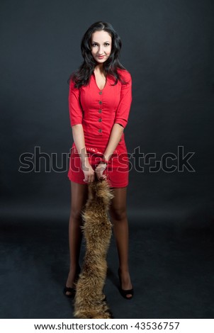 stock photo dark hair tall girl in red dress smiling with long fur collar