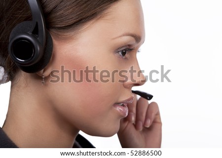 call center operator girl with dark hair and cute face talking on line with person isolated over white background