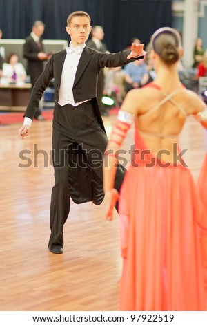 MINSK-BELARUS, MARCH 4: Unidentified Dance Couple performs Adults Standard Program on The Republic of Belarus WDSF Championship, 2 Stage, on March 4, 2012 in Minsk, The Republic of Belarus